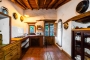 The kitchen is simple and rustic